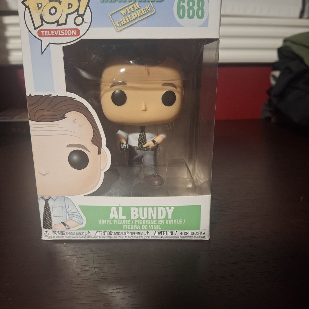 Funko Pop Al Bundy Figure with White and Gray Outfit